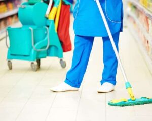 Retail cleaning team in NYC store ensuring spotless workspace for improved productivity and customer satisfaction