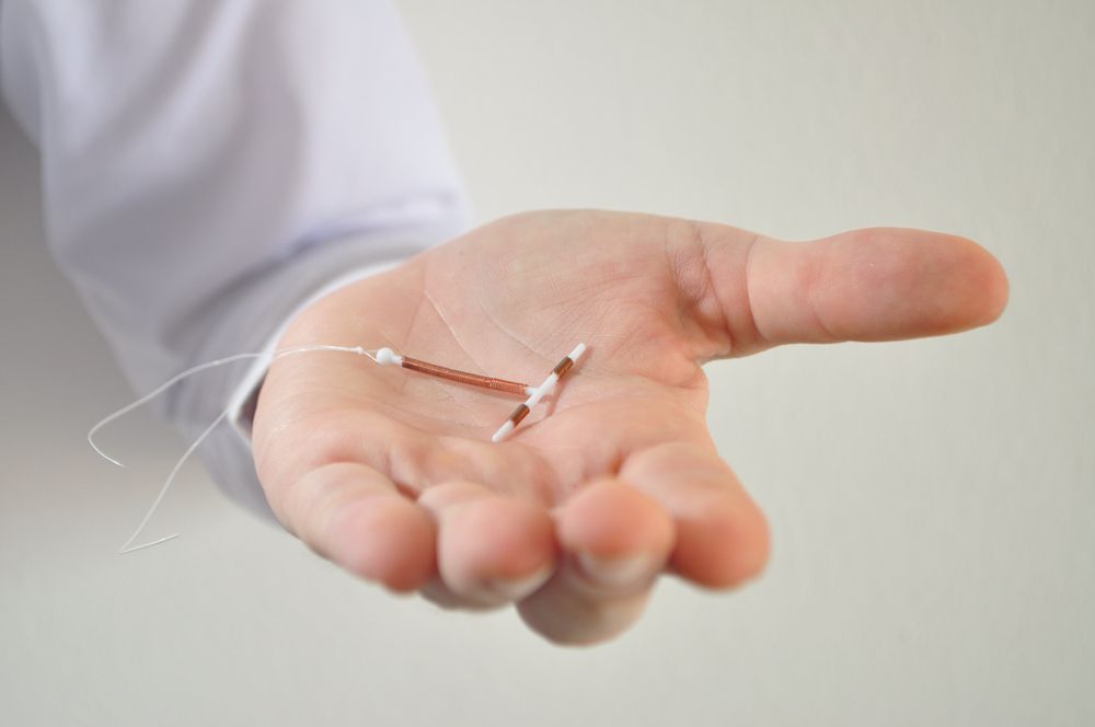 Can you use tampons with an IUD?